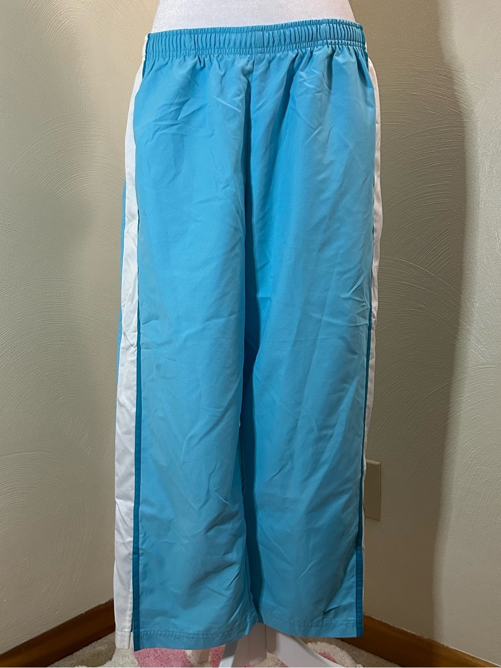 Nike blue track pants with white side stripes size large